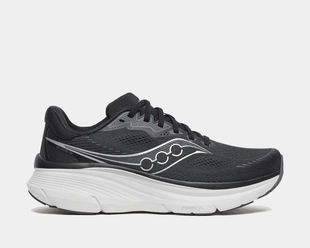 Saucony Guide 19 running shoe in black and silver, side view on a plain light gray background